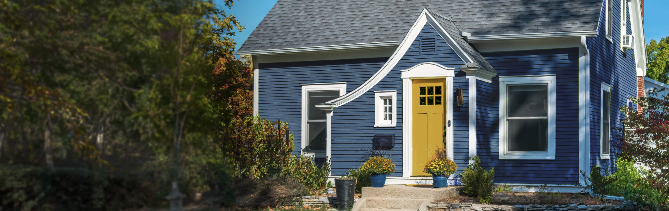blue house with yellow door