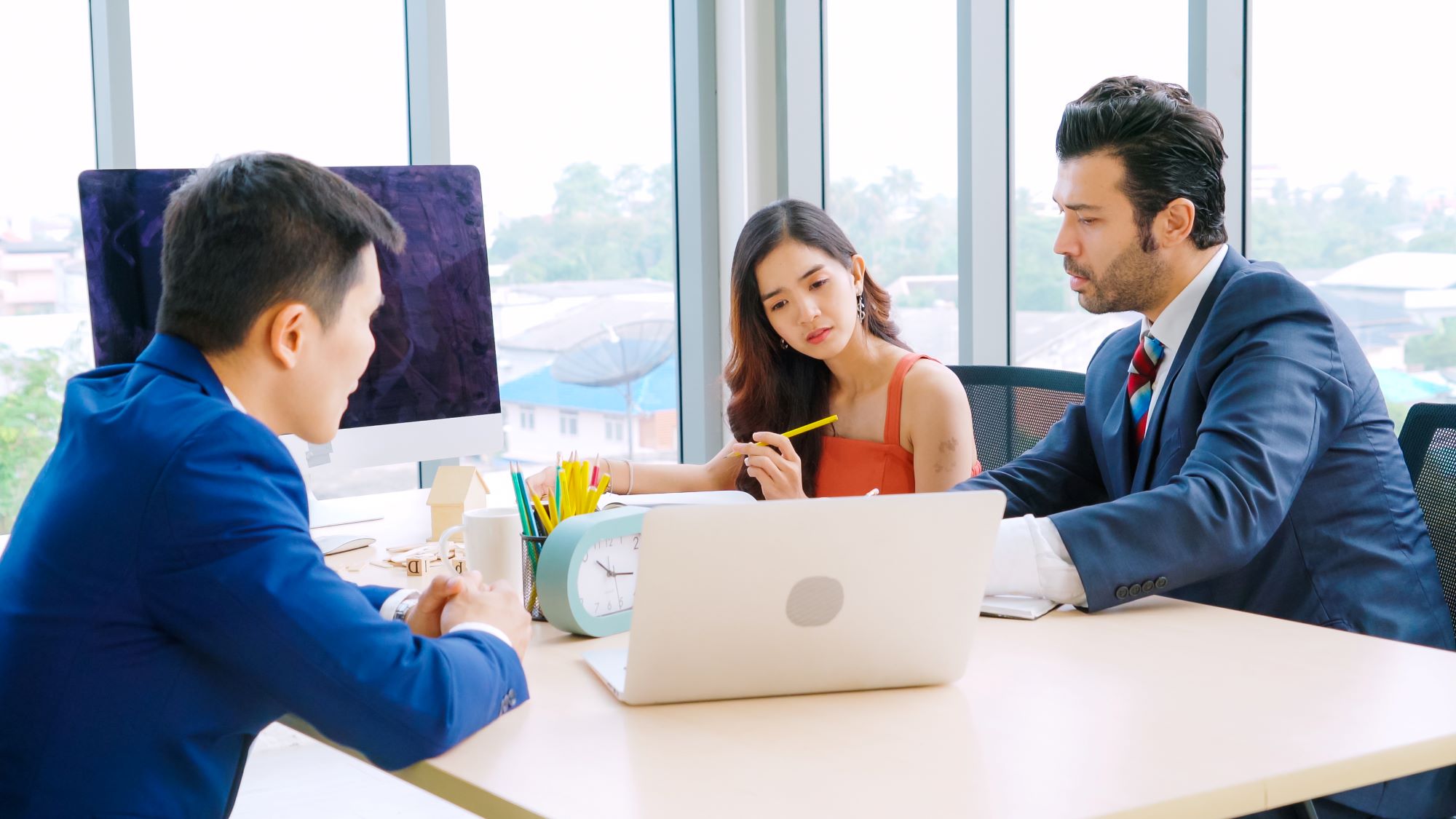 at table on laptops